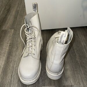 Dr. Martens white boot. Worn once, perfect condition.